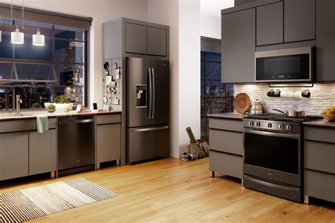 beige kitchen cabinet with black stainless steel appliances|black stainless steel color schemes.